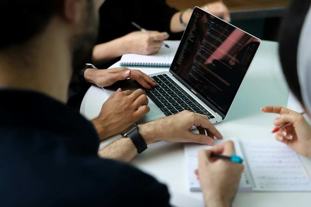 business team discussing software